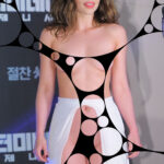 Emilia Clarke almost nude